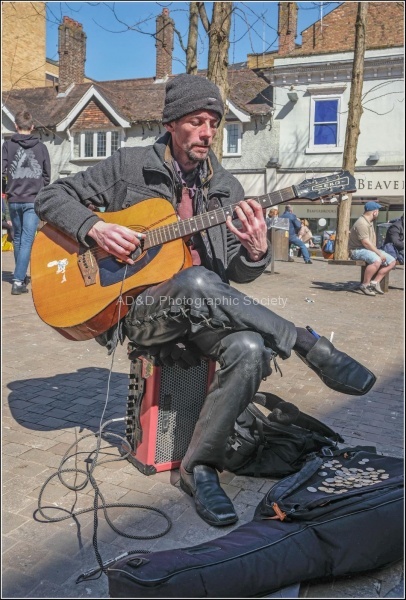 Street Musician, by John Cavana