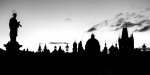 Saint with long lens