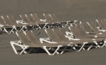 Sun Lounges, by John Emmett