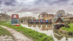 John Cavana - The Fleet's In - Narrowboats at Heyf