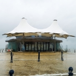 Wendy Meagher - Pier brollies on a rainy day